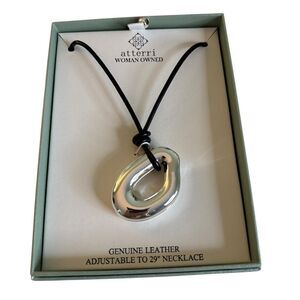 Sleek Silver Toned Open Circle Pendant on Adjustable Black Leather Cord.